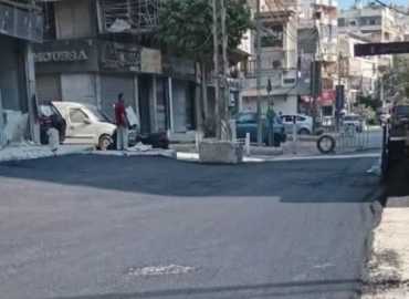 بلدية حارة حريك تتابع تعبيد شارع أمام بناية روتكس بإشراف اتحاد بلديات الضاحية