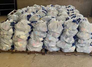 بلدية شيحين توزع 250 حصة غذائية مُقدّمة من جمعية 