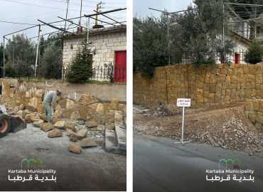 بلدية قرطبا تعيد ترميم وتلبيس الجدران المحيطة بكنيسة القديس جرجس