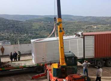 بلدية حانين توزع 10 بيوت جاهزة على عائلات متضررة بدعم من جمعية الإمام الحسن – أستراليا