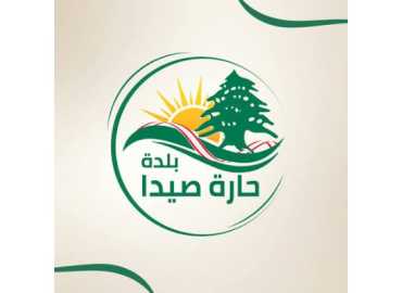 رئيس بلدية حارة صيدا يشرف على توزيع مساعدات للنازحين في مجمع الكرامة
