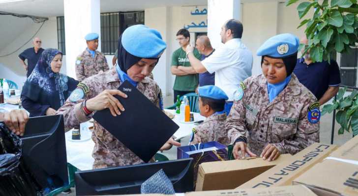 تجهيزات معلوماتية ووحدة تكييف الى بلدية أرزون مُقدمة من الكتيبة الماليزية
